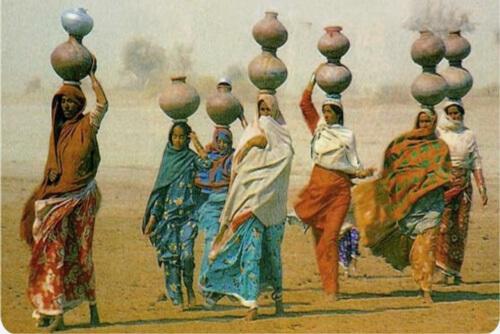 Women-fetching-water-from-rainy-ponds-known-as-Tobbas