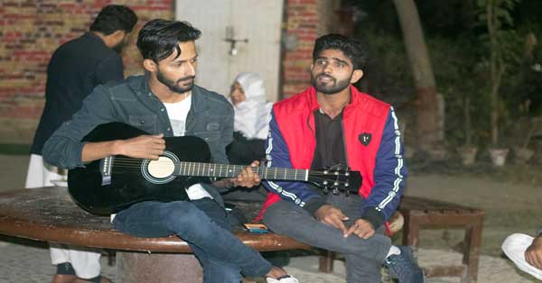 Youngsters Playing Guitar at Gulzar Sadiq Park